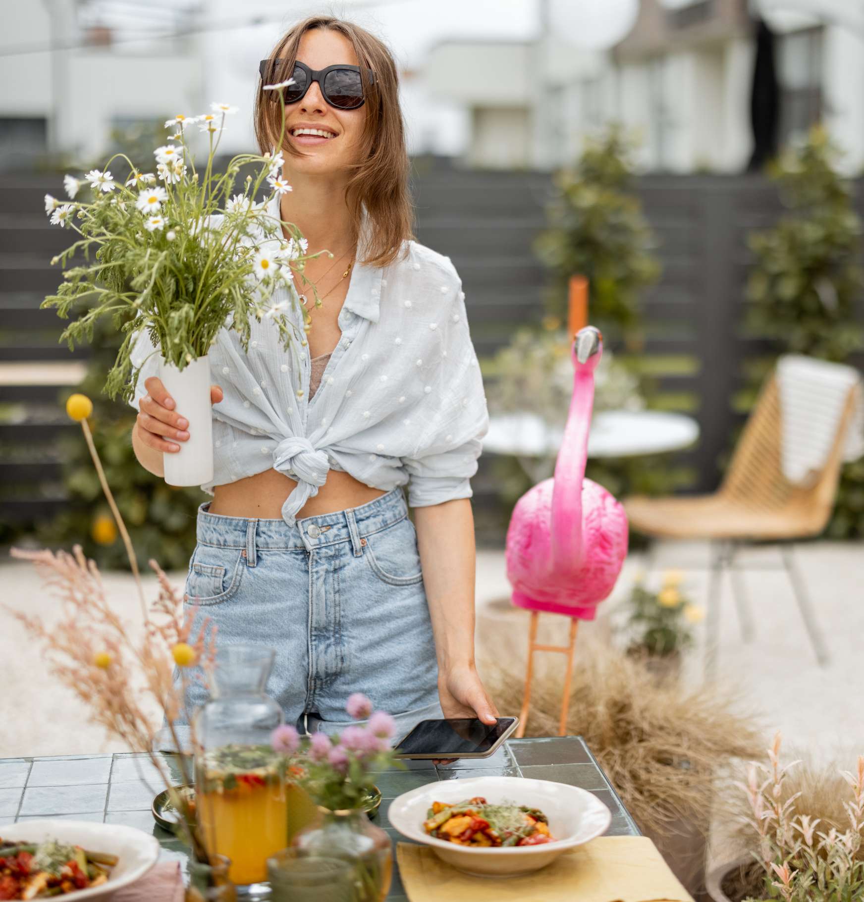 woman-decorating-dining-table-outdoors-2021-09-04-12-50-08-utc(1)